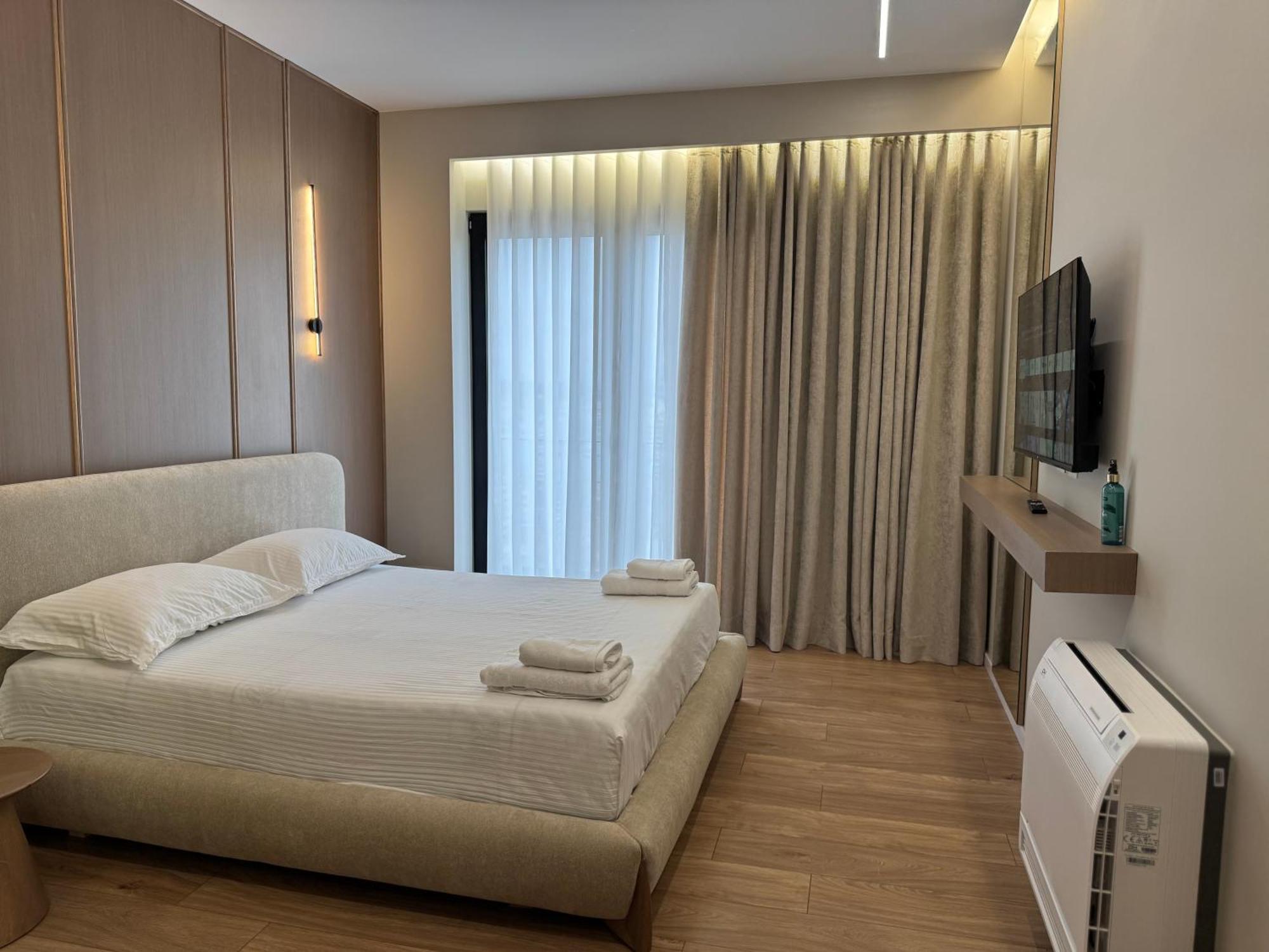 Square Inn Garden Aparthotel Тирана Экстерьер фото